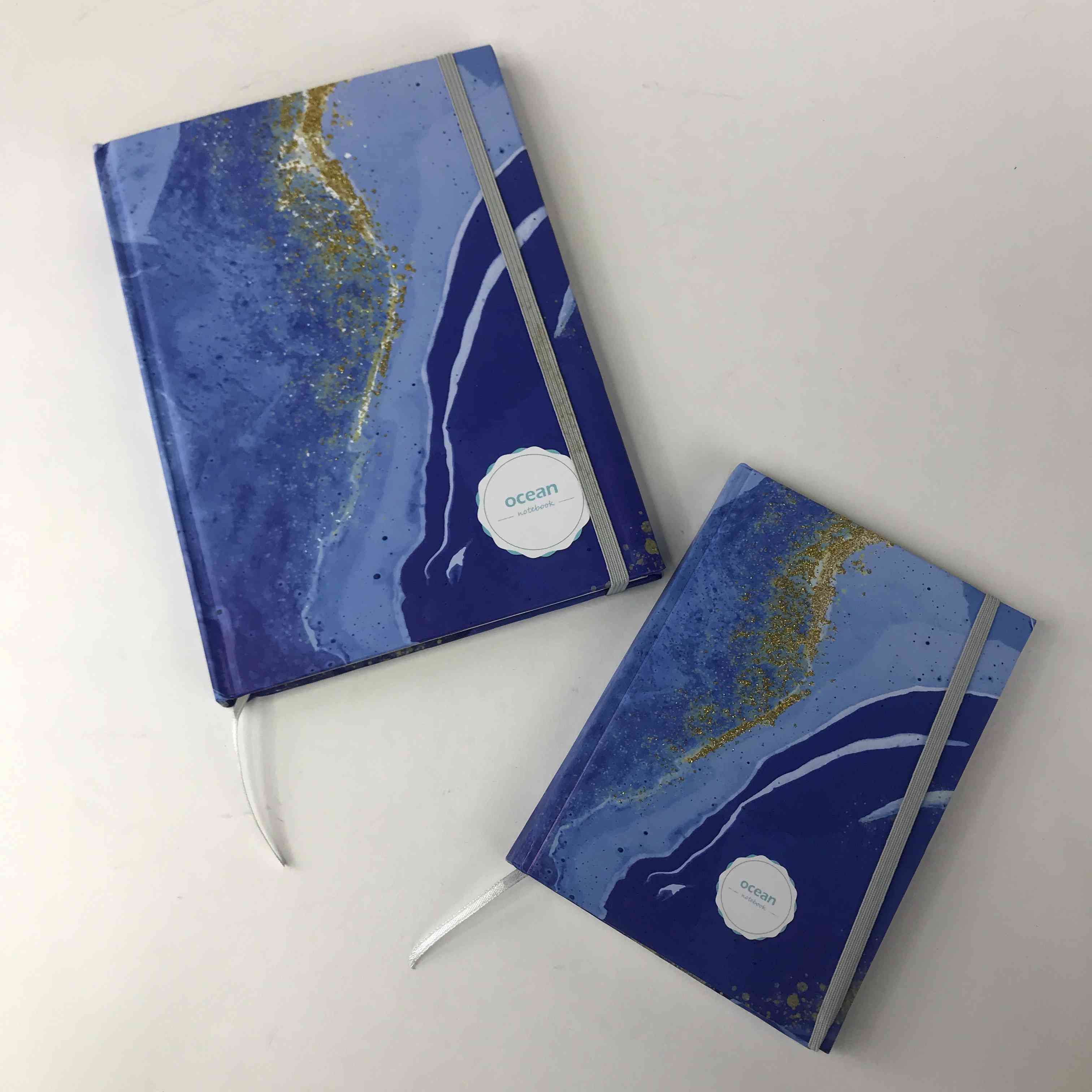 Cuaderno de encuadernación con hilo Ocean con estampado dorado